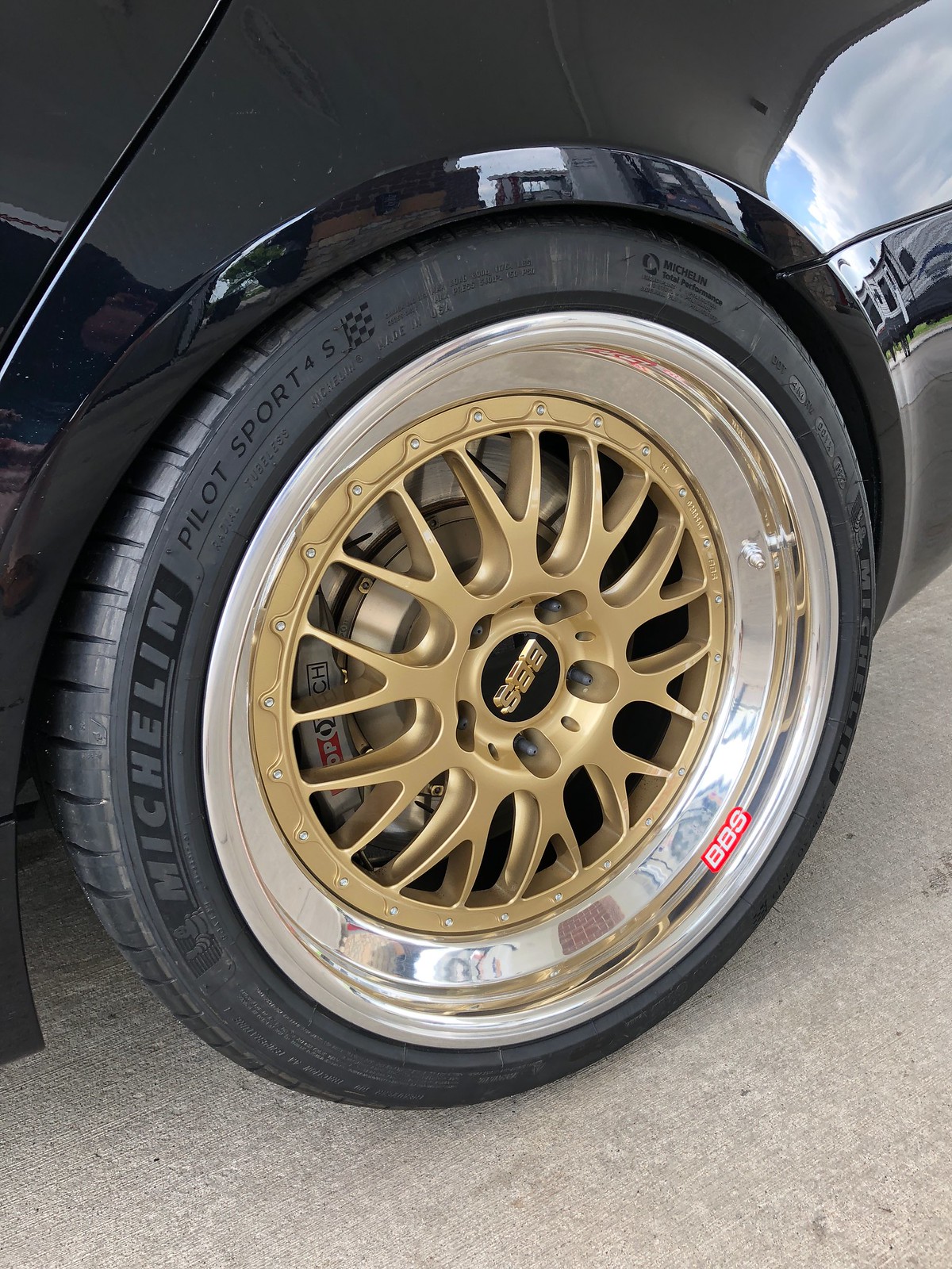 IPhone photo of aftermarket rim on car - virtual wheel fitment source